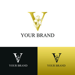 Golden Luxury Initial letter V with February Iris flower for cosmetic, Jewelry, boutique, hotel logo concept vector