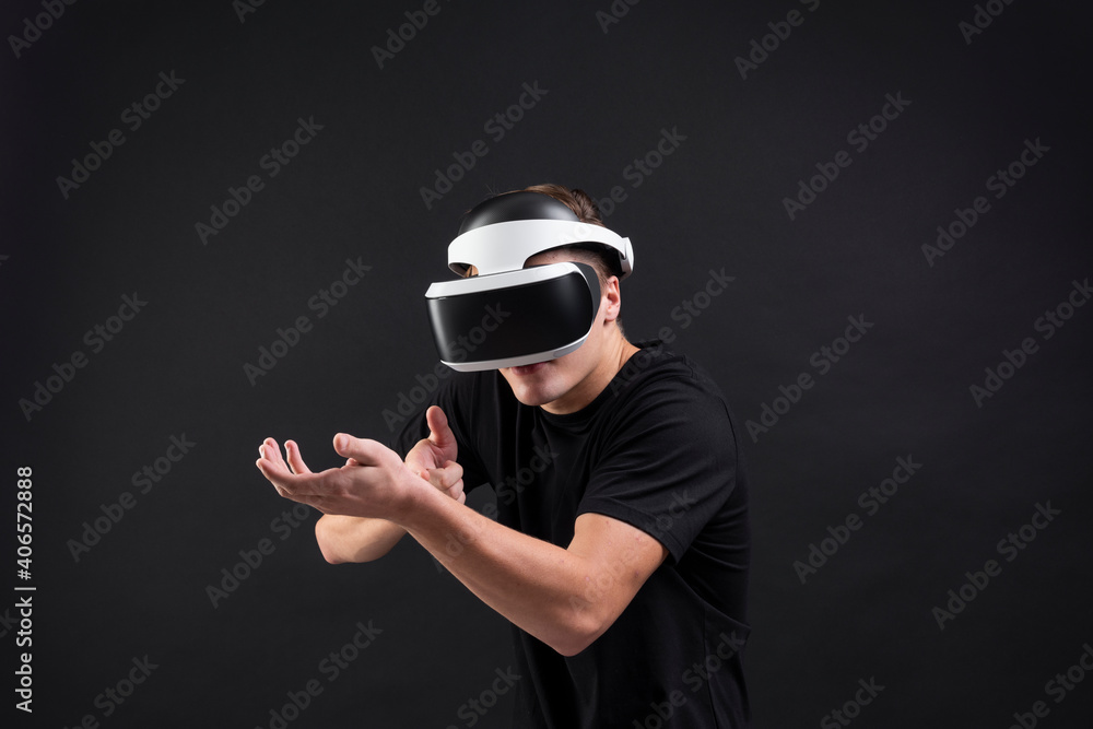 Poster man using virtual reality gadget for entertainment
