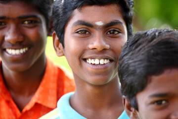 Group of Indian happy teen boys looking at the camera.