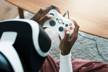 African man playing a game with gaming controller © Rawpixel.com