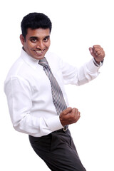 Indian young businessman enjoying the success on white background.
