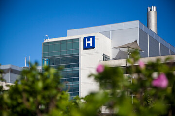 Modern hospital and sign