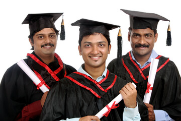 Indian graduates isolated on white background.