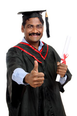 smiling graduate with diploma