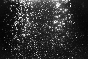 black bokeh from water