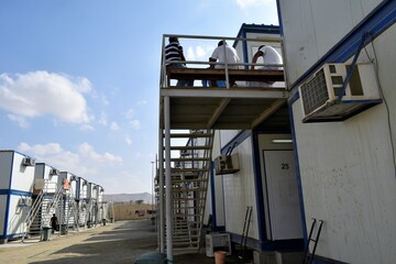 Portacabin, porta cabin, temporary labours camp , Mobile building in industrial site or office container Portable house and office cabins. Labor Camp. Porta cabin. small temporary houses