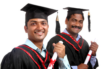Indian graduates isolated on white.