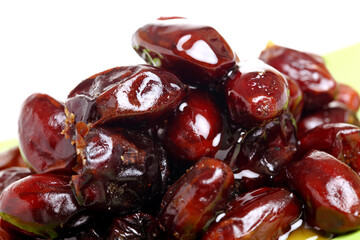 Healthy dates on white background