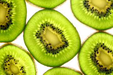 Fototapeta premium kiwi slices on white
