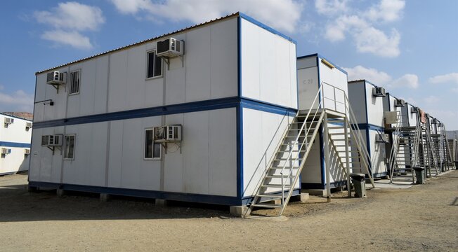 Portacabin, porta cabin, temporary labours camp , Mobile building in industrial site or office container Portable house and office cabins. Labor Camp. Porta cabin. small temporary houses