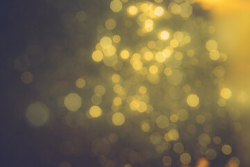 Gold bokeh blur defocus in black backgeound