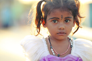 Cute Indian little girl at outdoor.