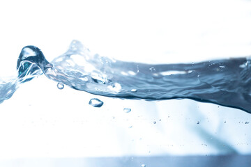Clean water with water droplets and waves