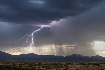 Lightning, thunder cloud and dark stormy sky