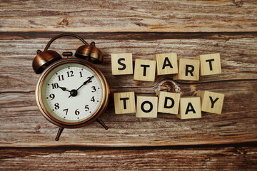 Start Today Word alphabet letters on wooden background