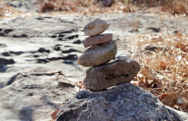 Fototapeta na wymiar A pile of small rocks stacked together