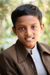 Indian teen boy smiling portait.