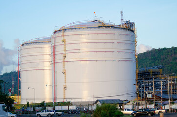 Oil refinery industry at sunset - factory - petrochemical plant