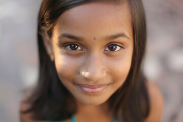 Fototapeta premium Indian beautiful teen girl posing to camera with smile