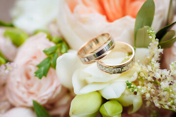 wedding rings and flowers