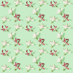 Seamless regular creative pattern from dry white and red flowers, printing on fabric, wrapping paper.