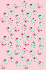 Regular pattern from homemade gingerbreads with letters love. Saint Valentine day texture. Holiday food concept.