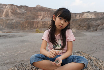 Naklejka na ściany i meble Portrait Asian cute child girl 7 years old smiling happy