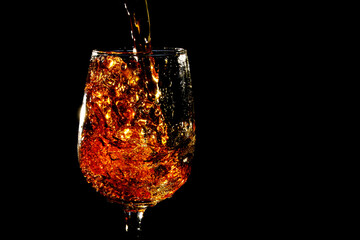 Pouring water into wine glass