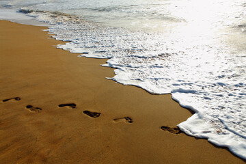 footprints on the beach