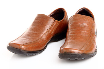 Brown man's shoes isolated on white background