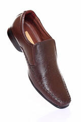 Brown man's shoe isolated on white background