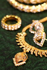 Gold ornaments on textured background.