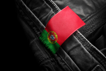 Tag on dark clothing in the form of the flag of the Portugal
