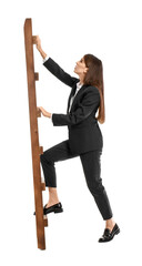 Businesswoman climbing up ladder isolated on white background © Pixel-Shot