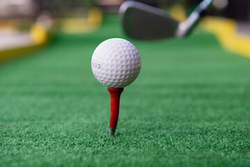Close up golf ball on tee stand