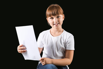 Little actress on dark background