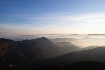 Fototapeta premium Mountain peaks covered with fog in Sri Lanka.