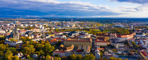 Obraz premium Aerial view of Olomouc cityscape overlooking Gothic spire of Saint Wenceslas Cathedral on sunny autumn day, Moravia, Czech Republic