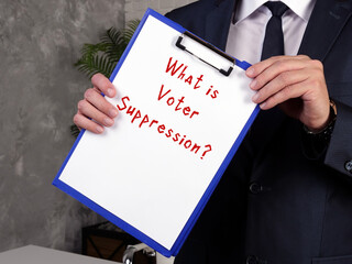  Juridical concept meaning Voter Suppression? with inscription on the sheet.