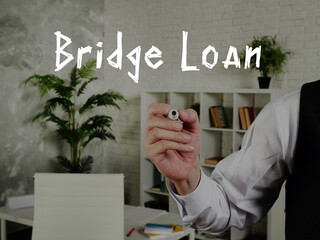 Business concept meaning Bridge Loan with phrase on the piece of paper.