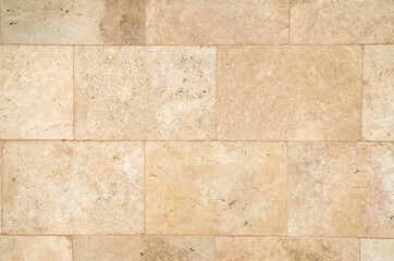 New  light brown stone wall  closeup