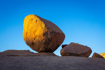 Eroded granite boulder in the Erongo mountains, Namibia, at sunrise