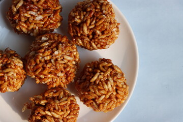 Indian Traditional Puffed Rice Balls is a sweet made using puffed rice mixed with jaggery, Murmura Laddoo, Churmura Laddoo or Pori Urundai
