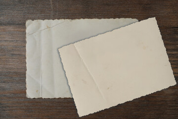 empty mock up background of old wood, set of vintage photos with blank, back side of the photo, concept family genealogy, memories, generational ties, museum historical materials