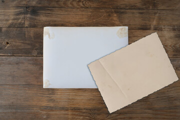 empty mock up background of old wood, set of vintage photos with blank, back side of the photo, concept family genealogy, memories, generational ties, museum historical materials