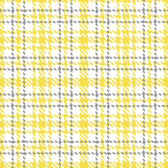 Illuminating yellow and ultimate gray seamless plaid pattern, vector illustration. Seamless tartan pattern with yellow and gray lines on white. Checkered geometric background