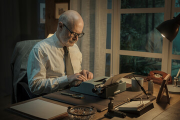 Vintage journalist working in the office