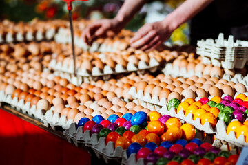 colored eggs on market stall