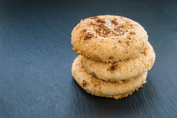 Mantecado. Spanish traditional christmas sweet made from flour, almonds and lard. garnished with sugar and cinnamon.