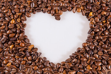 White heart love symbol in coffee beans